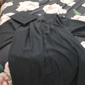 Black graduation cap and gown